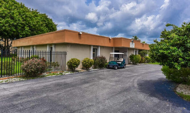 2615 NE 3rd Ct Unit 217, Boynton Beach, FL 33435 - view of front facade featuring stucco siding