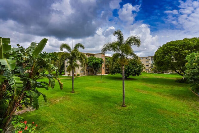 2615 NE 3rd Ct Unit 217, Boynton Beach, FL 33435 - view of home's community featuring a yard