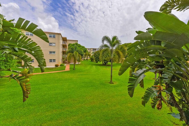 2615 NE 3rd Ct Unit 217, Boynton Beach, FL 33435 - view of property's community with a yard