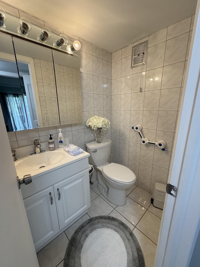 203 S Windsor I Unit 203, West Palm Beach, FL 33417 - half bath with toilet, vanity, tile walls, decorative backsplash, and tile patterned floors