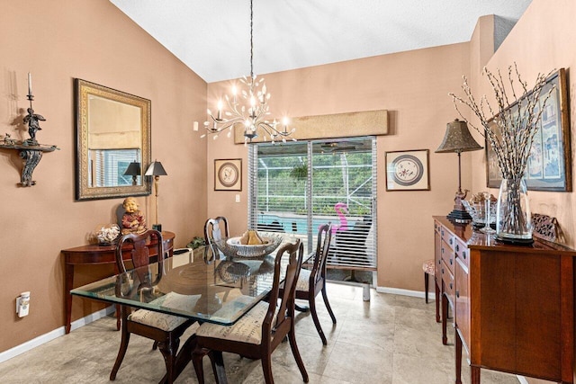 16243 E Calder Dr, Loxahatchee, FL 33470 - dining area with vaulted ceiling, baseboards, and a chandelier