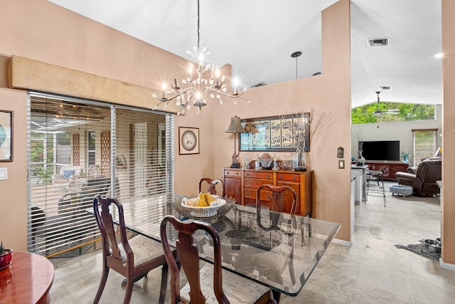 16243 E Calder Dr, Loxahatchee, FL 33470 - dining space with vaulted ceiling and a chandelier