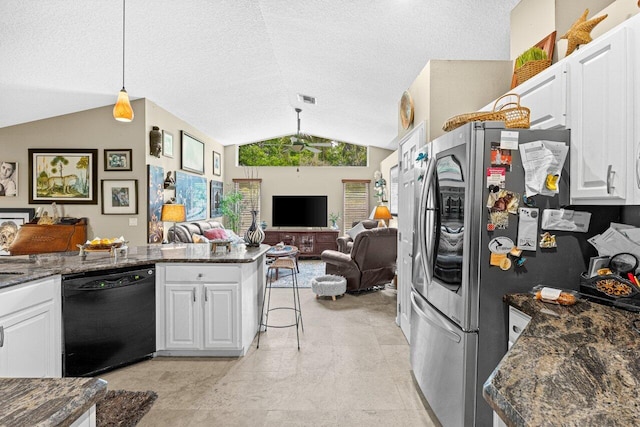 16243 E Calder Dr, Loxahatchee, FL 33470 - kitchen with dishwasher, lofted ceiling, freestanding refrigerator, open floor plan, and white cabinetry