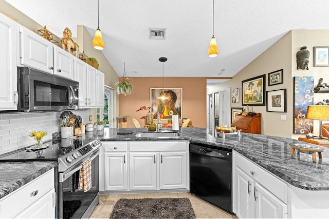 16243 E Calder Dr, Loxahatchee, FL 33470 - kitchen with dishwasher, lofted ceiling, stainless steel electric stove, a peninsula, and white cabinetry