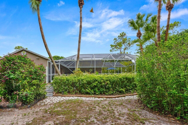 16243 E Calder Dr, Loxahatchee, FL 33470 - view of yard with a lanai