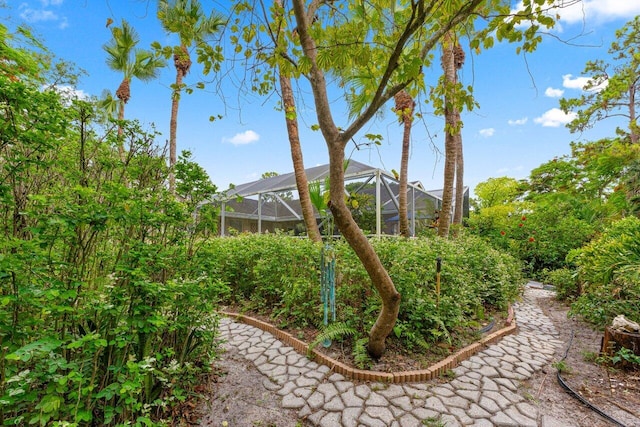 16243 E Calder Dr, Loxahatchee, FL 33470 - view of yard featuring glass enclosure