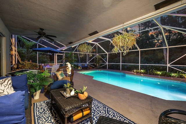 16243 E Calder Dr, Loxahatchee, FL 33470 - swimming pool featuring a ceiling fan, a patio, and glass enclosure