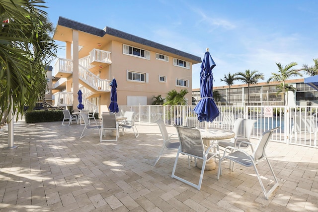 131 Doolen Ct Unit 310, North Palm Beach, FL 33408 - view of patio featuring outdoor dining space