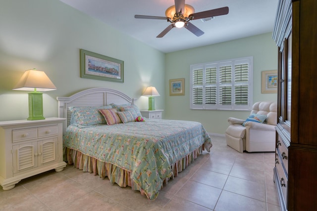 169 Stony Point Dr, Sebastian, FL 32958 - bedroom with light tile patterned floors, baseboards, and a ceiling fan