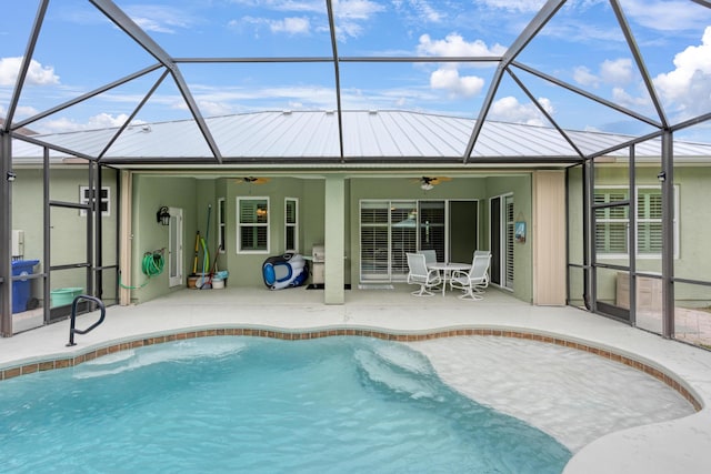 169 Stony Point Dr, Sebastian, FL 32958 - outdoor pool featuring ceiling fan, a patio, and glass enclosure
