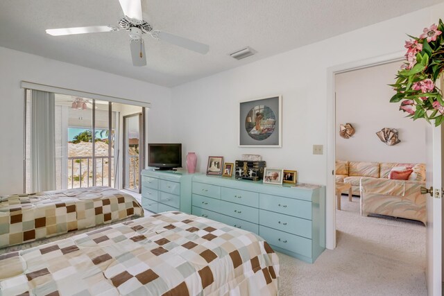 7610 Tahiti Ln Unit 201, Lake Worth, FL 33467 - bedroom featuring access to exterior, light carpet, and a ceiling fan