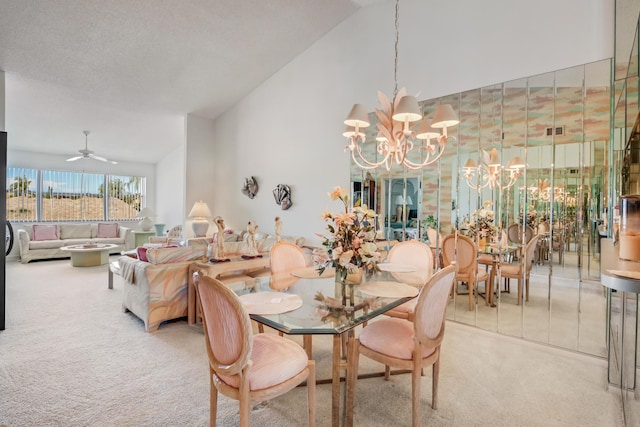 7610 Tahiti Ln Unit 201, Lake Worth, FL 33467 - dining space featuring light colored carpet, a chandelier, a ceiling fan, and high vaulted ceiling