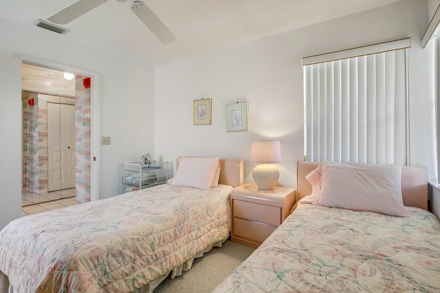 7610 Tahiti Ln Unit 201, Lake Worth, FL 33467 - bedroom with light tile patterned floors and ceiling fan