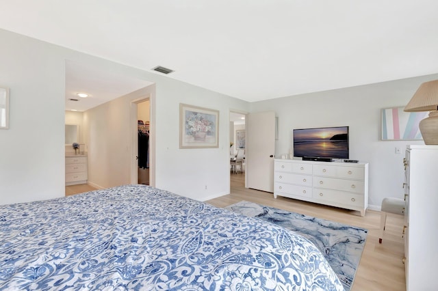 19819 Boca W Dr Unit 4033, Boca Raton, FL 33434 - bedroom with wood finished floors, baseboards, a spacious closet, and a closet