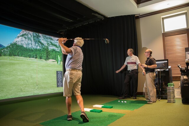 19819 Boca W Dr Unit 4033, Boca Raton, FL 33434 - rec room featuring golf simulator, carpet, and ornamental molding