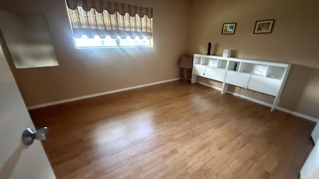 425 Lake Helen Dr, West Palm Beach, FL 33411 - bedroom with wood finished floors and baseboards