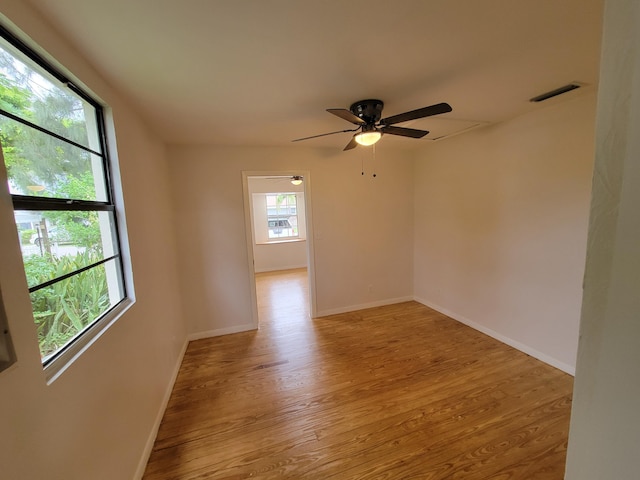 510 N 5th St, Lantana, FL 33462 - unfurnished room featuring ceiling fan, wood finished floors, and baseboards