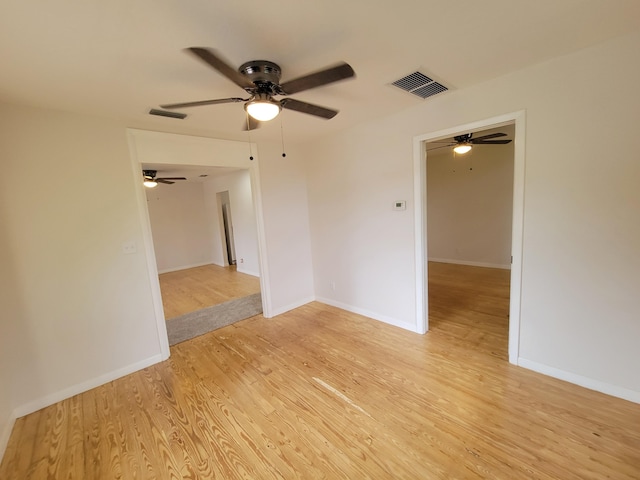 510 N 5th St, Lantana, FL 33462 - spare room featuring ceiling fan, light wood finished floors, and baseboards