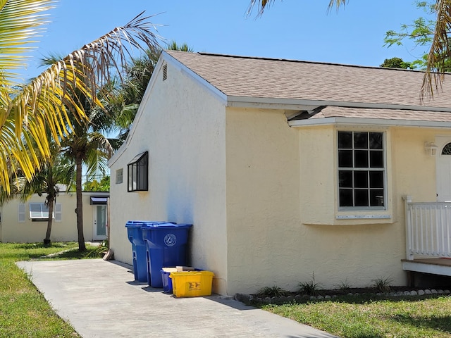 510 N 5th St, Lantana, FL 33462 - view of property exterior with roof with shingles, stucco siding, and a patio