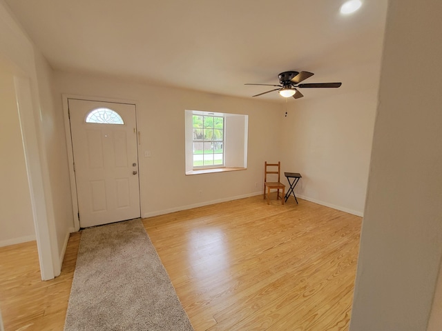 510 N 5th St, Lantana, FL 33462 - foyer entrance featuring light wood finished floors, a ceiling fan, and baseboards