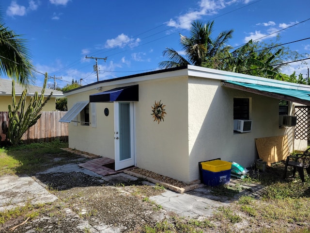 510 N 5th St, Lantana, FL 33462 - back of house with stucco siding and cooling unit