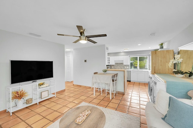 2135 NE 4th Way, Boca Raton, FL 33431 - living area with a ceiling fan, light tile patterned floors, recessed lighting, and baseboards