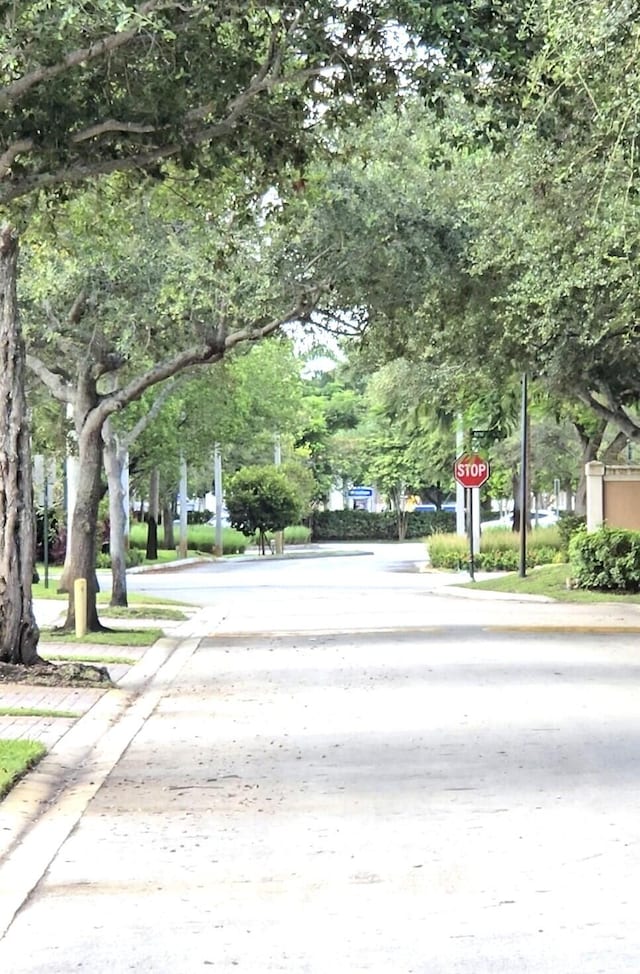 2470 NW 99th Way Unit 2470, Sunrise, FL 33322 - view of street featuring traffic signs and curbs