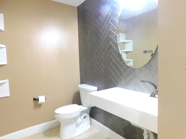 2470 NW 99th Way Unit 2470, Sunrise, FL 33322 - half bathroom featuring tile walls and tile patterned floors
