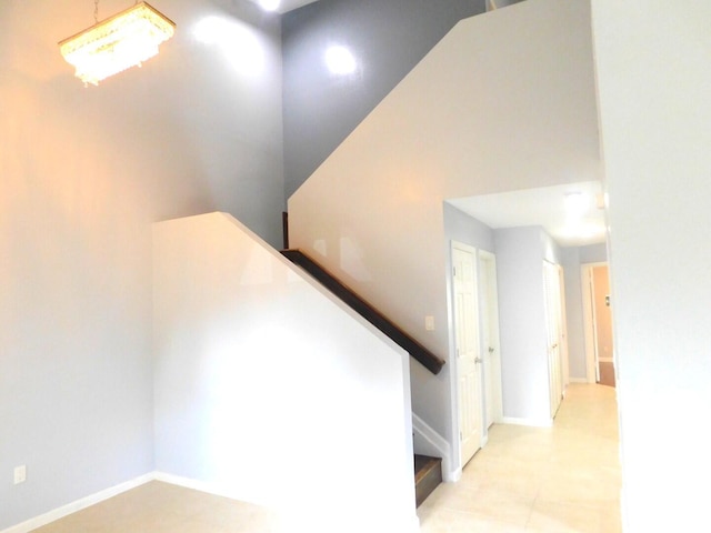 2470 NW 99th Way Unit 2470, Sunrise, FL 33322 - staircase featuring baseboards
