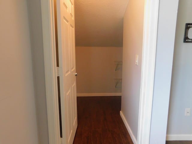 2470 NW 99th Way Unit 2470, Sunrise, FL 33322 - hallway featuring dark wood finished floors and baseboards