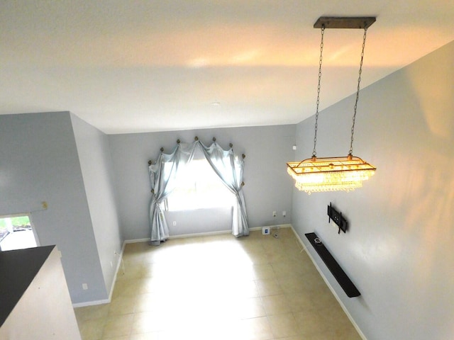 2470 NW 99th Way Unit 2470, Sunrise, FL 33322 - unfurnished dining area featuring healthy amount of natural light and vaulted ceiling