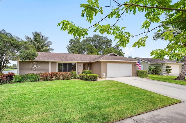 129 Parkwood Dr, Royal Palm Beach, FL 33411 - ranch-style house with a garage, stucco siding, a front yard, and concrete driveway