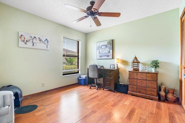 129 Parkwood Dr, Royal Palm Beach, FL 33411 - home office featuring wood finished floors, ceiling fan, a textured ceiling, and baseboards