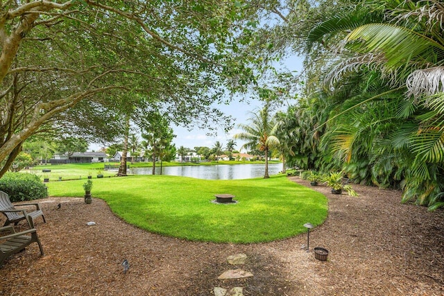 129 Parkwood Dr, Royal Palm Beach, FL 33411 - view of green lawn with a water view