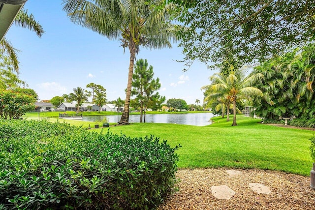129 Parkwood Dr, Royal Palm Beach, FL 33411 - view of green lawn with a water view