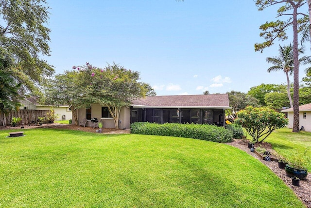 129 Parkwood Dr, Royal Palm Beach, FL 33411 - back of property featuring a sunroom and stucco siding