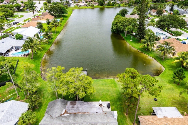 129 Parkwood Dr, Royal Palm Beach, FL 33411 - aerial view of residential area featuring a large body of water and a pool