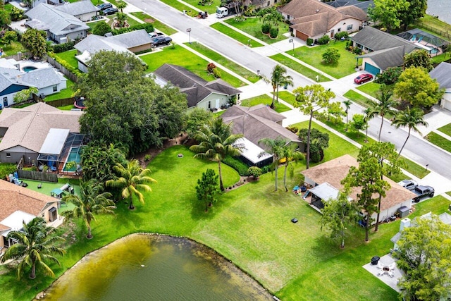 129 Parkwood Dr, Royal Palm Beach, FL 33411 - aerial view of residential area with a large body of water