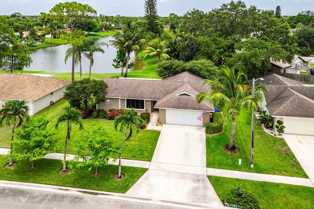 129 Parkwood Dr, Royal Palm Beach, FL 33411 - aerial view of property and surrounding area with a nearby body of water