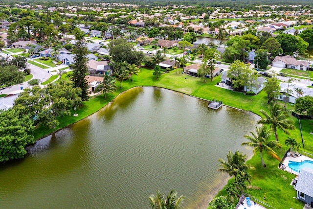 129 Parkwood Dr, Royal Palm Beach, FL 33411 - aerial view of residential area with a nearby body of water