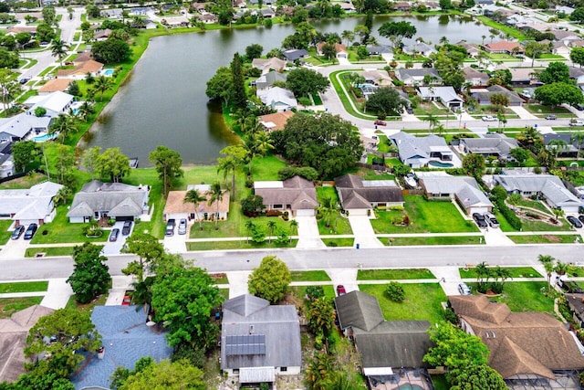 129 Parkwood Dr, Royal Palm Beach, FL 33411 - aerial overview of property's location with nearby suburban area and a large body of water
