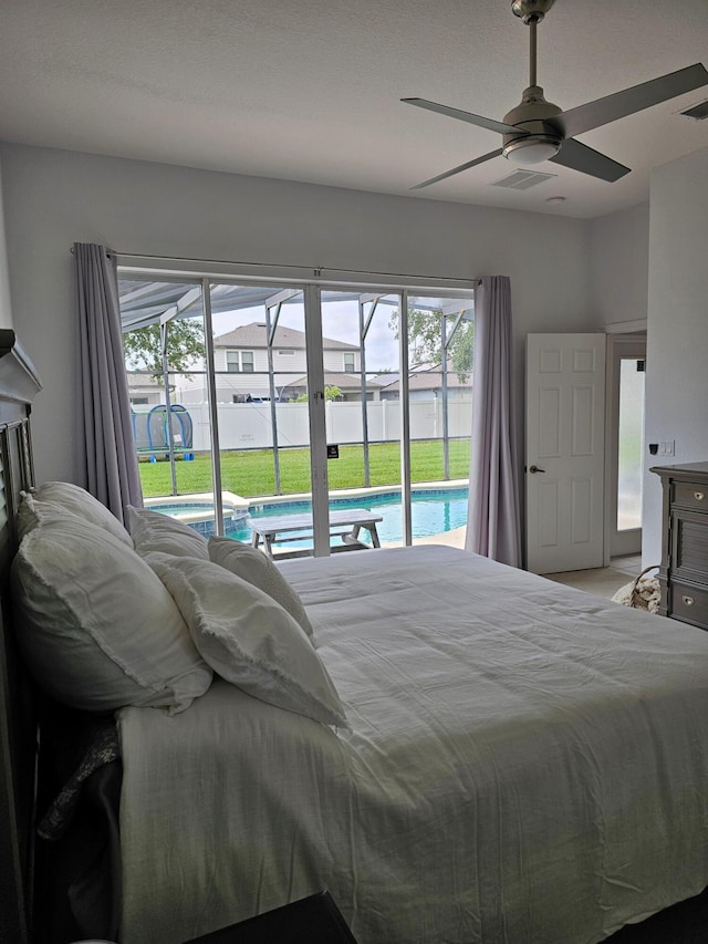 426 Cadiz Loop, Davenport, FL 33837 - bedroom featuring access to outside and a ceiling fan