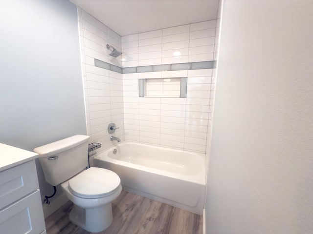 7724 77th Way, West Palm Beach, FL 33407 - full bath featuring wood finished floors, tub / shower combination, and vanity