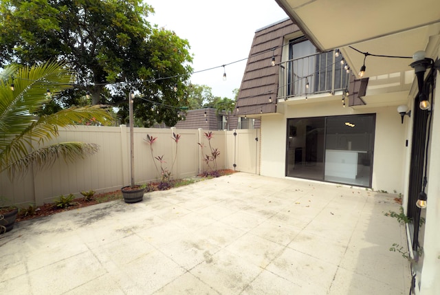7724 77th Way, West Palm Beach, FL 33407 - patio / terrace with a patio area and a garage