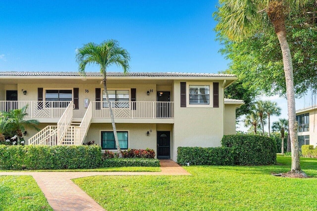36 Stratford Ln Unit H, Boynton Beach, FL 33436 - view of property with stairs