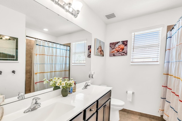 4340 Lago Dr, Deerfield Beach, FL 33064 - full bathroom featuring double vanity, toilet, tile patterned floors, a shower with shower curtain, and baseboards