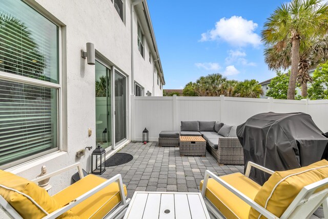 4340 Lago Dr, Deerfield Beach, FL 33064 - fenced backyard featuring an outdoor hangout area, a patio area, and grilling area
