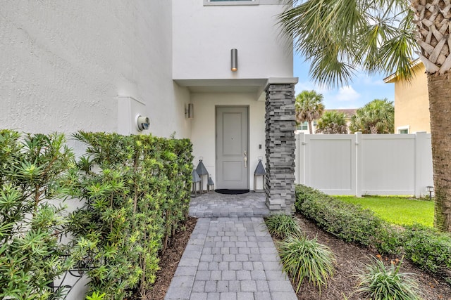 4340 Lago Dr, Deerfield Beach, FL 33064 - view of exterior entry with stucco siding