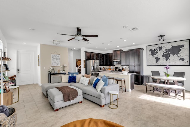 4340 Lago Dr, Deerfield Beach, FL 33064 - living room featuring ceiling fan, light tile patterned flooring, and recessed lighting