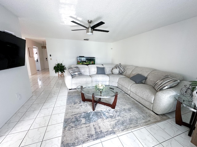 106 Lake Helen Dr, West Palm Beach, FL 33411 - living area featuring light marble finish floors, ceiling fan, and a textured ceiling